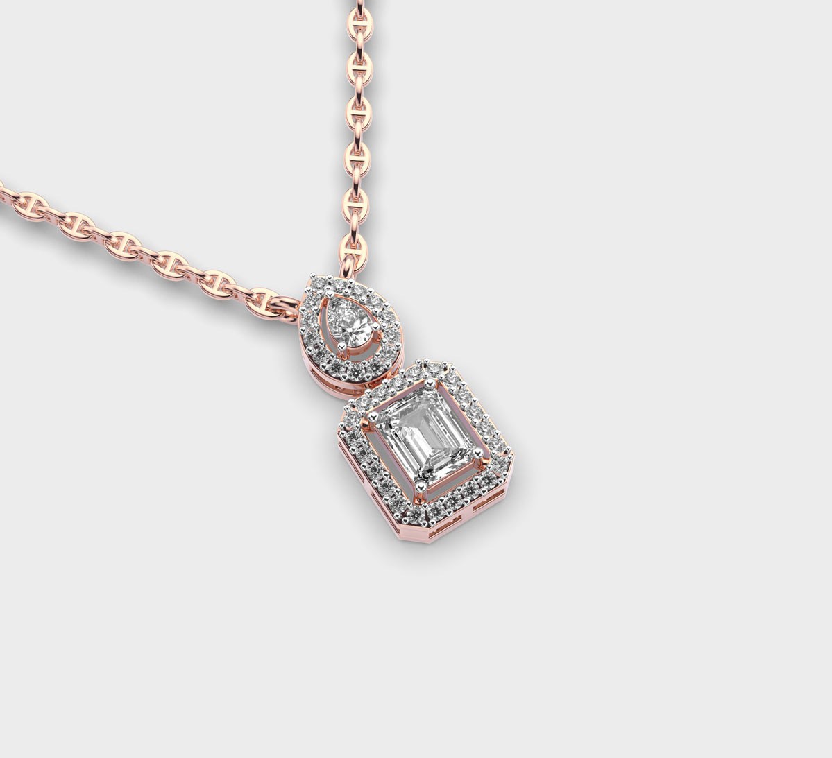 Graceful Pear and Emerald Cut Diamond Pendant with Chain